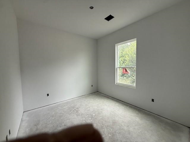 127 Riparian Elm Road Bertram, TX 78605 - Photo 18 of 25 a view of an empty room with a window