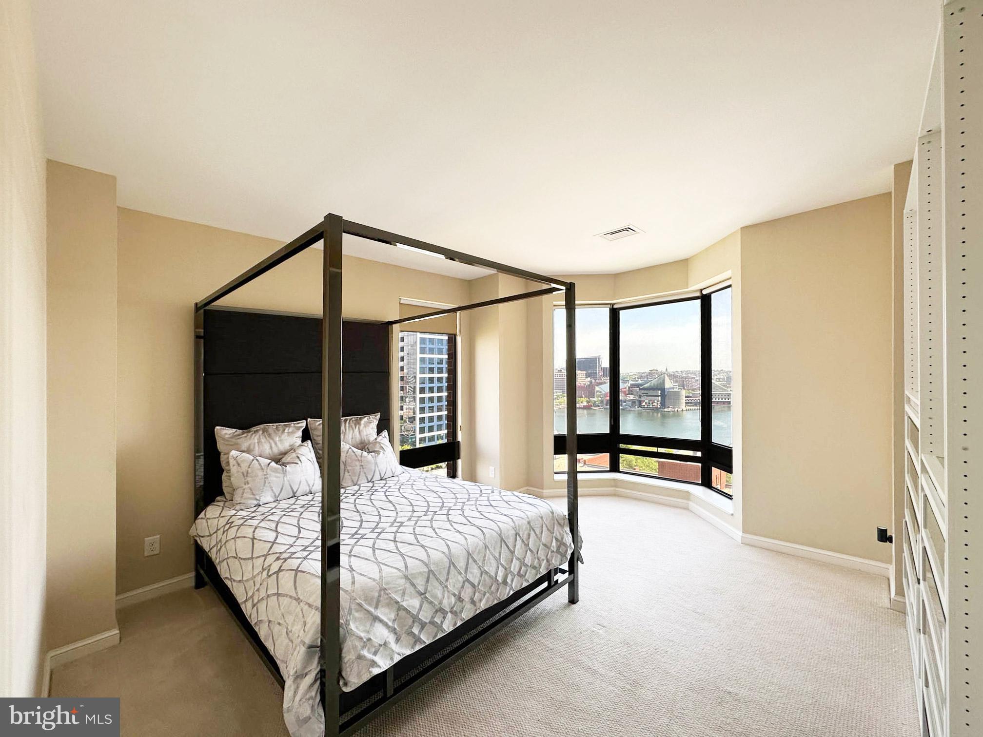 10 East Lee Street, Unit 1208 Baltimore, MD 21202 - Photo 4 of 21 Primary Bedroom