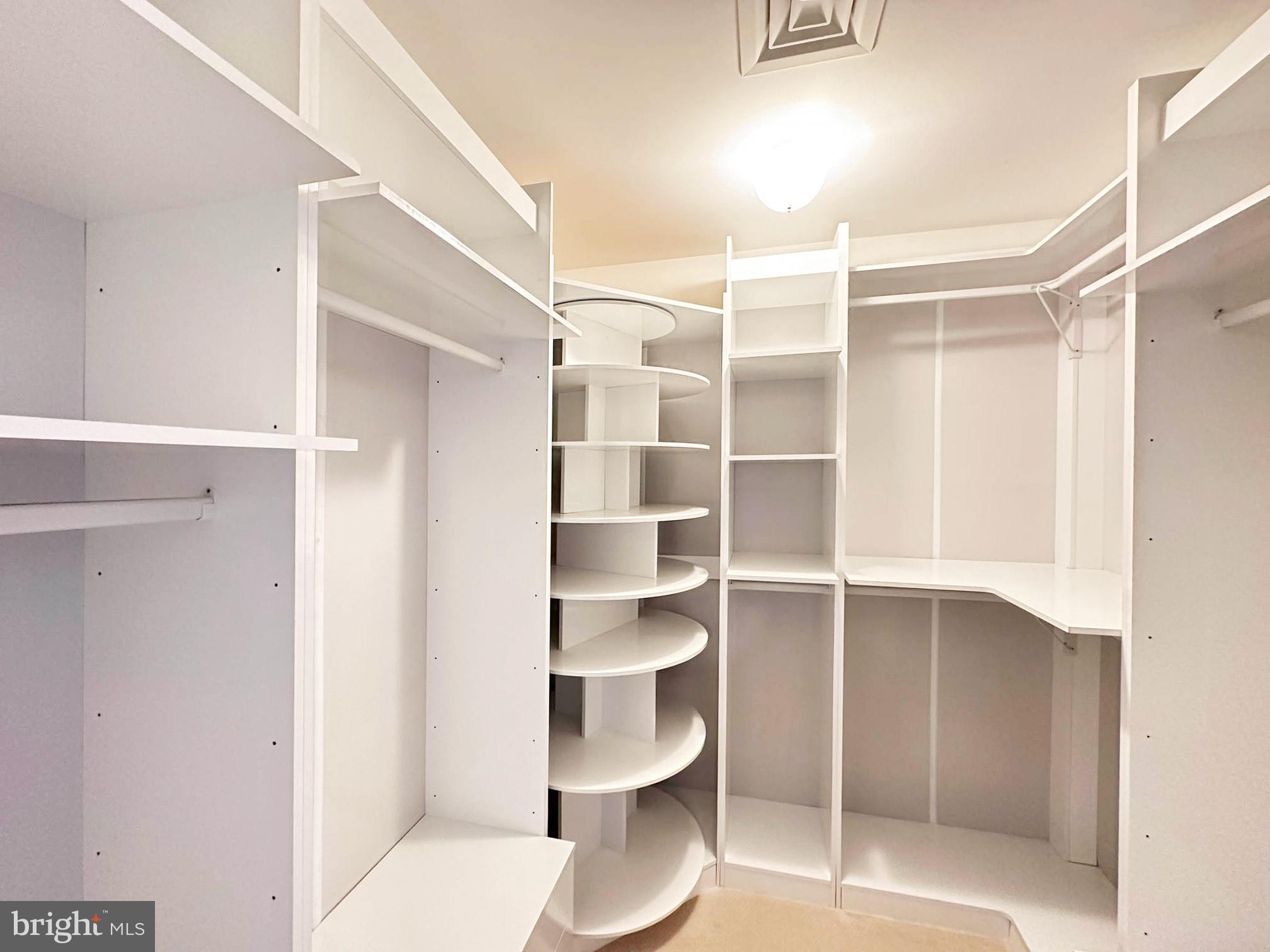 10 East Lee Street, Unit 1208 Baltimore, MD 21202 - Photo 8 of 21 Primary Walk-In Closet