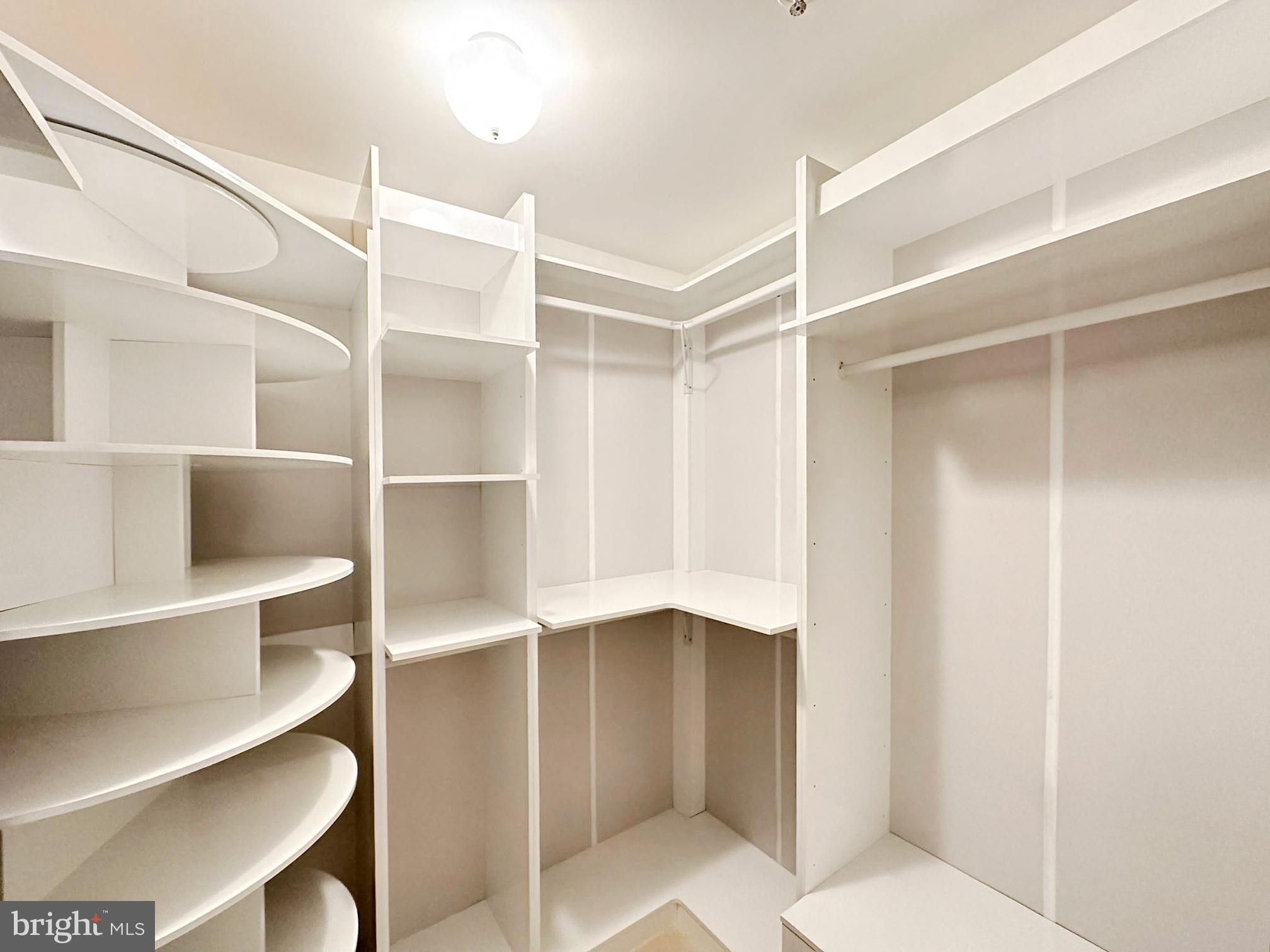 10 East Lee Street, Unit 1208 Baltimore, MD 21202 - Photo 9 of 21 Primary Walk-In Closet