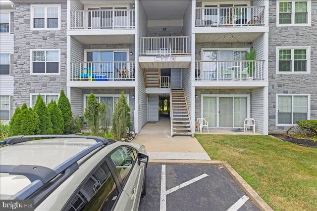 a view of a house with pool table and chairs