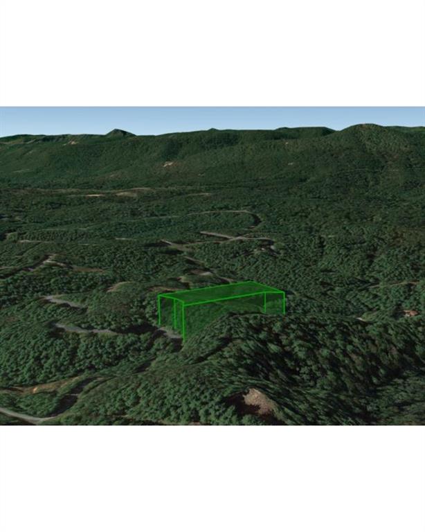 0 Collette Ridge Circle Collettsville, NC 28611 - Photo 4 of 5 a view of a lush green hillside and a houses