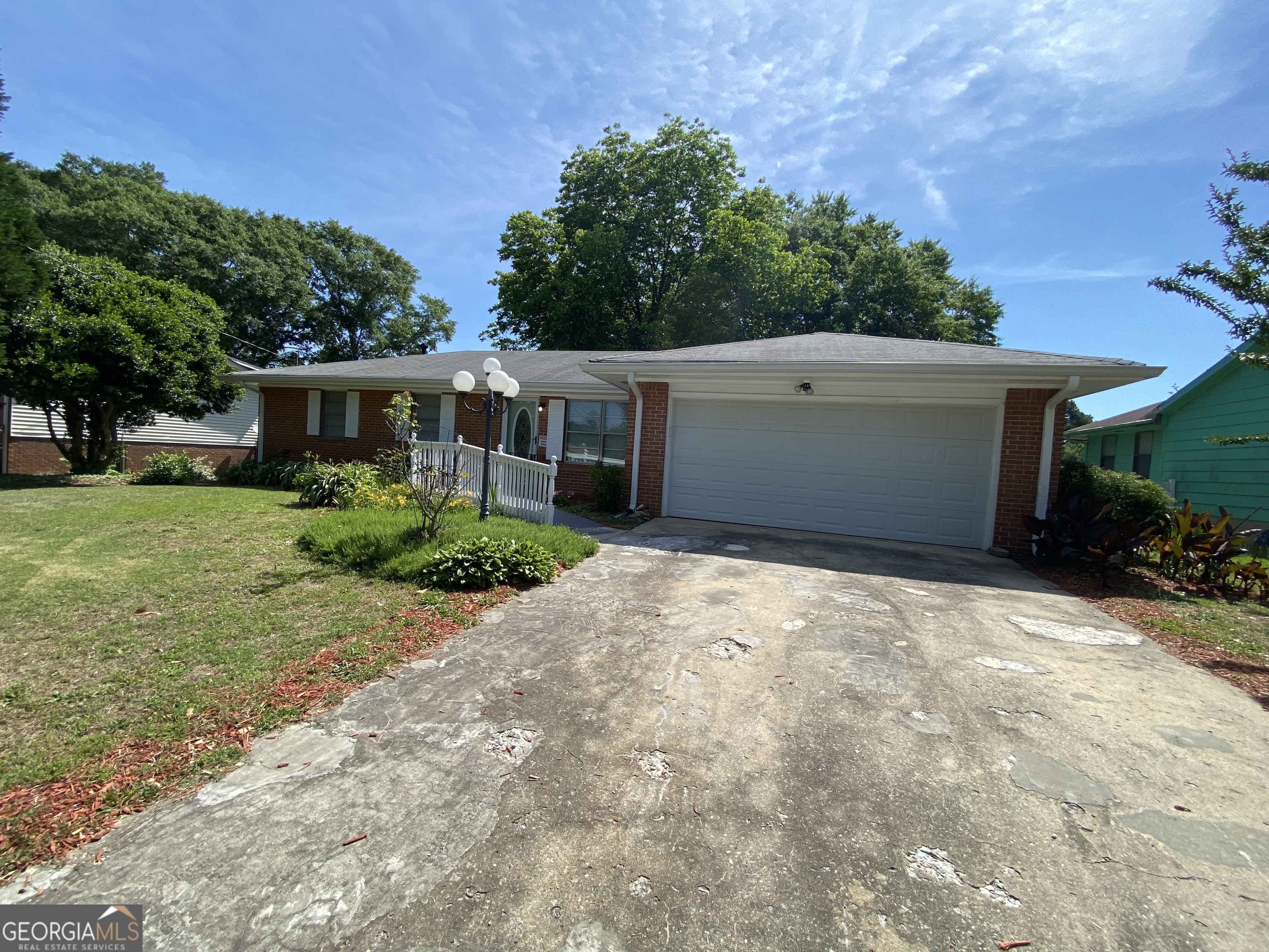 6092 Prestige Valley Road Morrow, GA 30260 - Photo 2 of 11 front view of a house with a yard