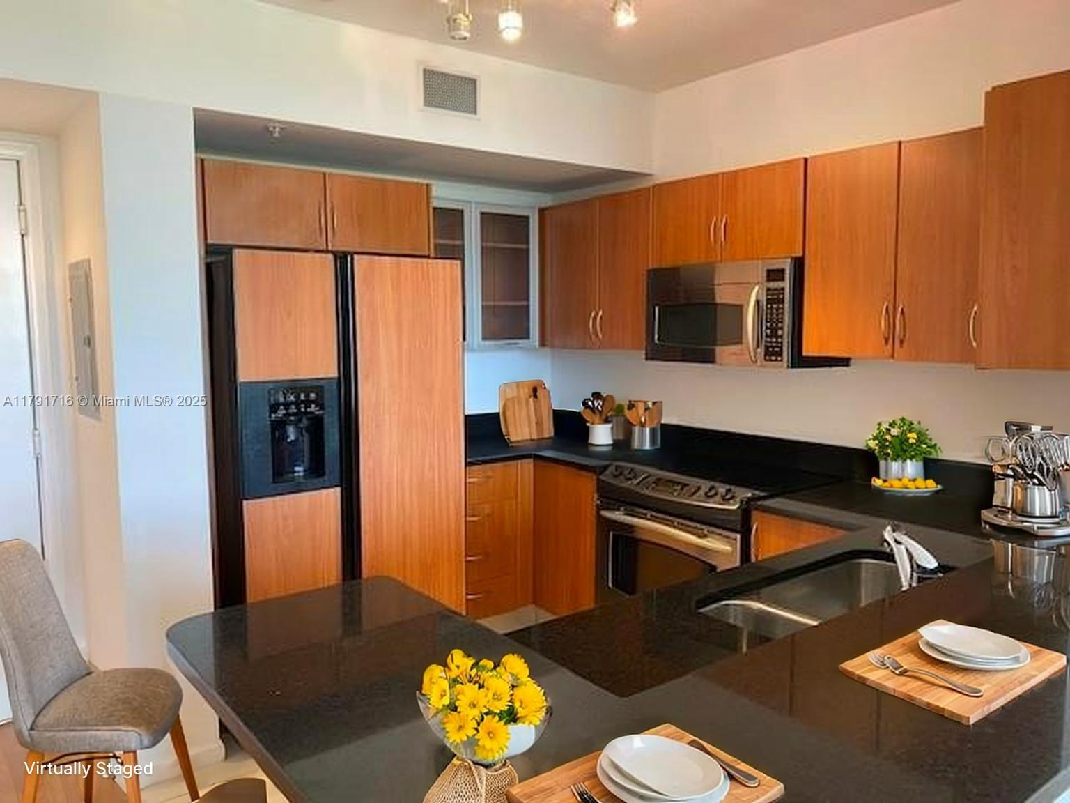 a reading room with furniture a rug and a window