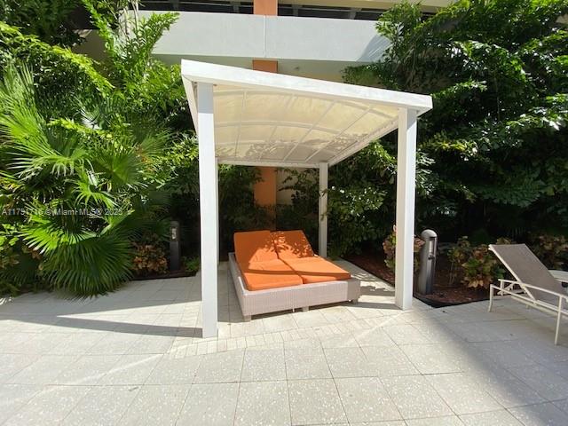 2775 Northeast 187th Street, Unit 311 Aventura, FL 33180 - Photo 15 of 28 a view of outdoor space and porch