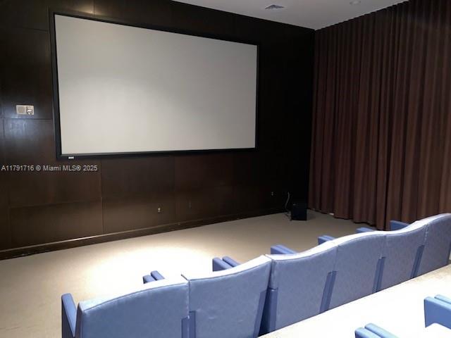 2775 Northeast 187th Street, Unit 311 Aventura, FL 33180 - Photo 18 of 28 a living room with furniture
