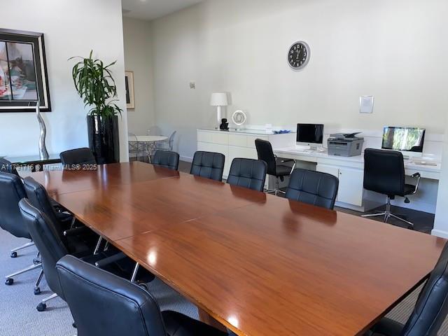 2775 Northeast 187th Street, Unit 311 Aventura, FL 33180 - Photo 21 of 28 a living room with furniture and flowers