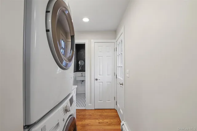 a view of entryway with stairs and wooden floor
