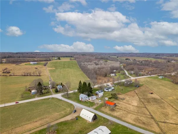 a kitchen with cabinets oven and a sink