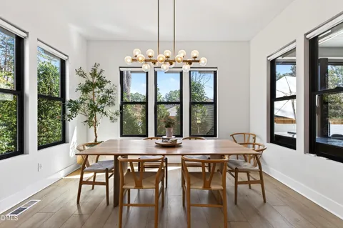 a view of a living room and dining room
