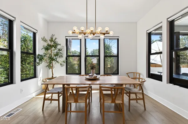 a bathroom with a shower and a sink