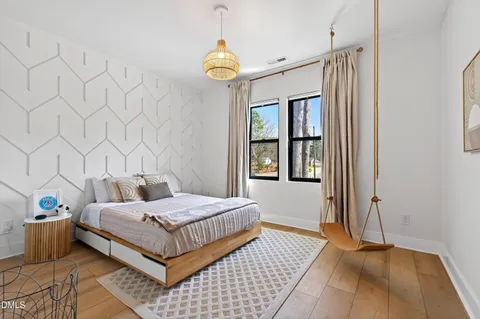 a view of a floor to ceiling window with wooden floor