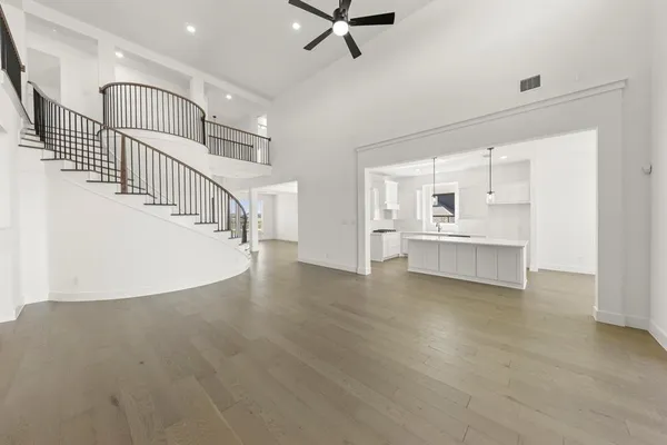 a view of an entryway with wooden floor