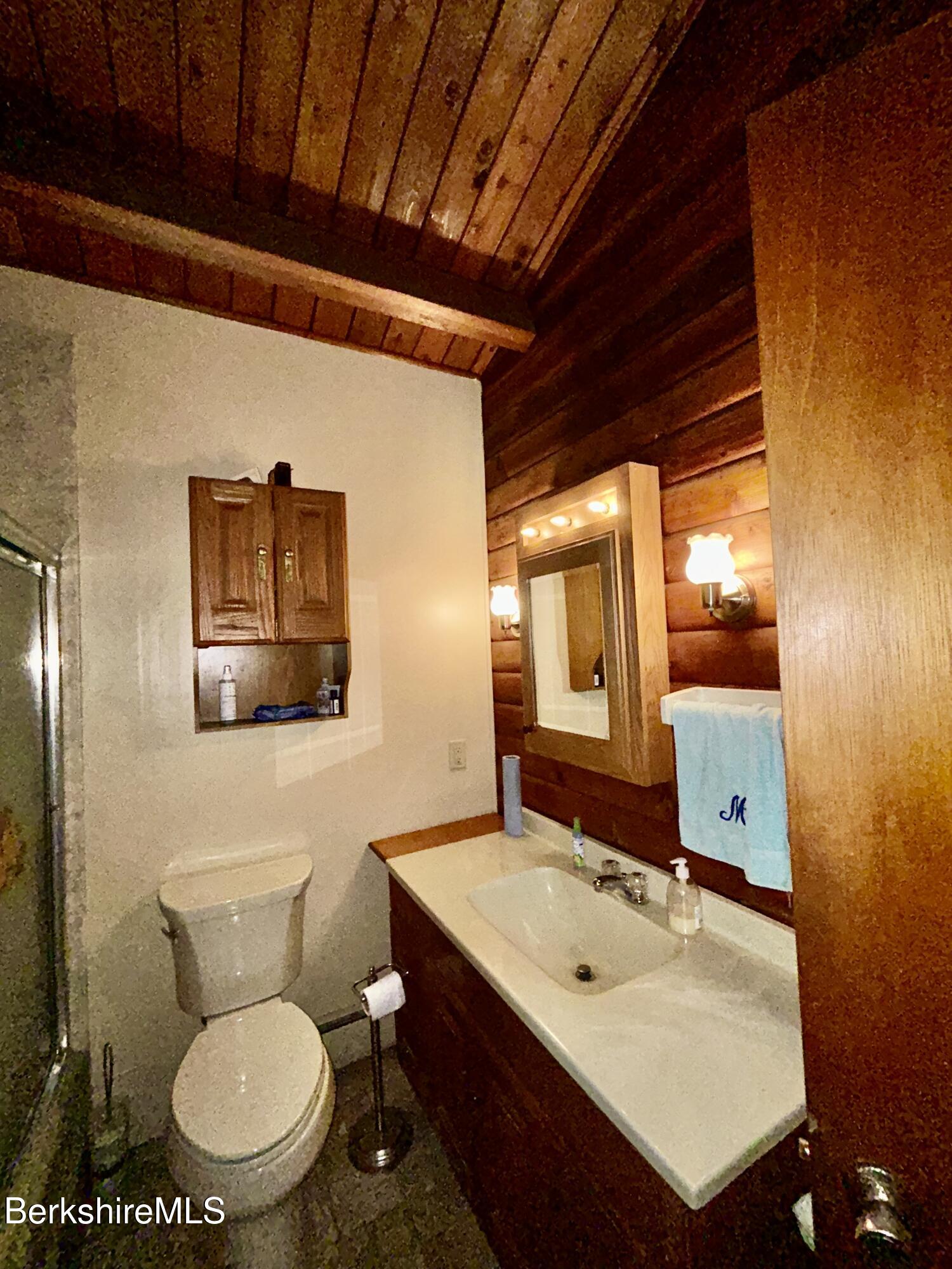 240 Kirchner Road Dalton, MA 01226 - Photo 21 of 36 a bathroom with a toilet sink and mirror