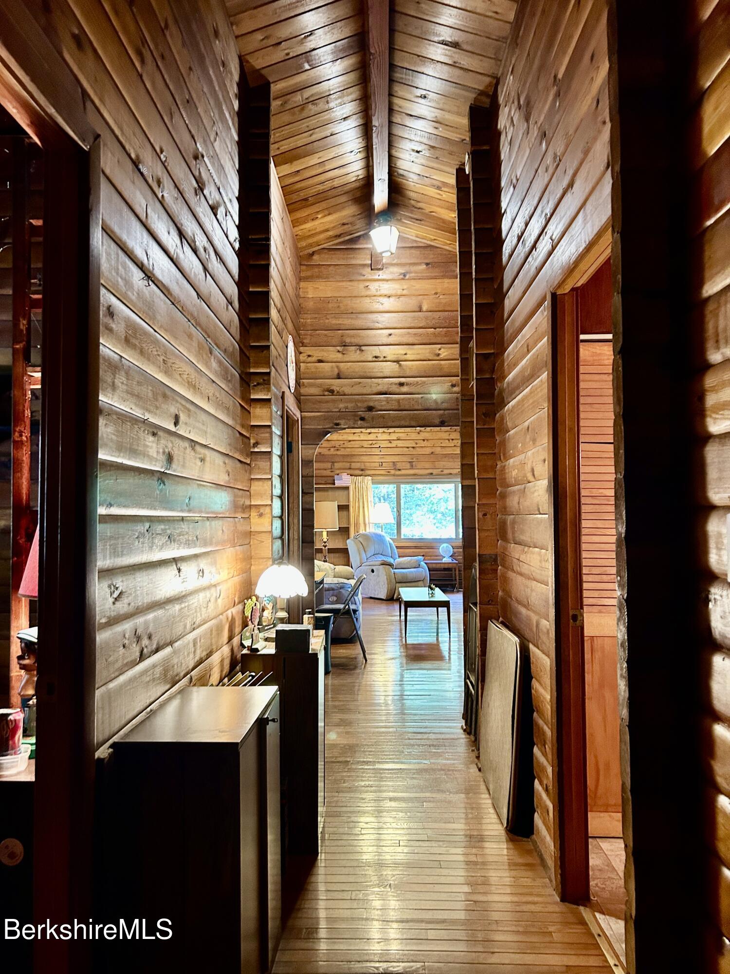 240 Kirchner Road Dalton, MA 01226 - Photo 28 of 36 a view of a balcony with chairs and wooden floor