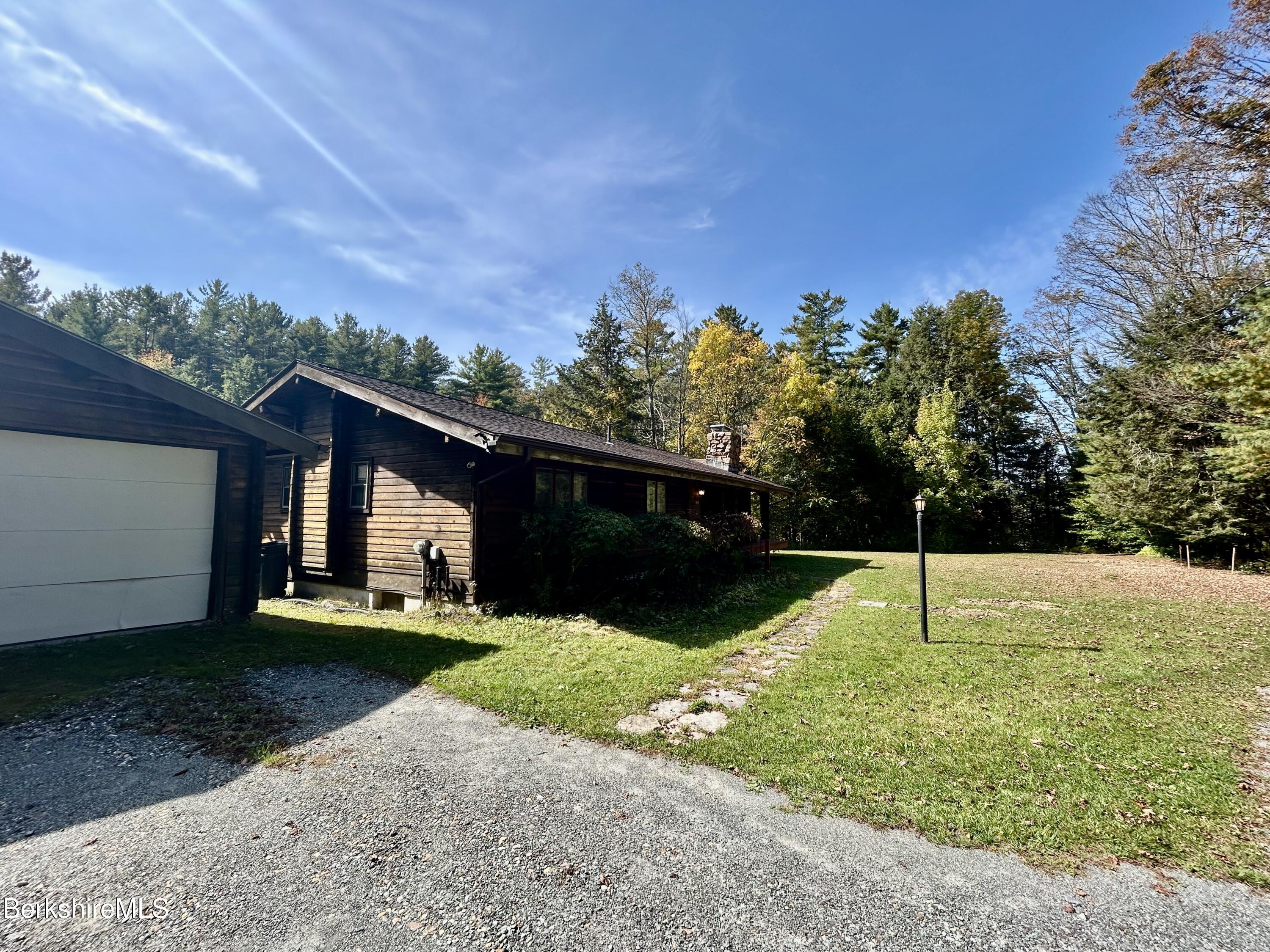 240 Kirchner Road Dalton, MA 01226 - Photo 33 of 36 a backyard of a house with lots of green space