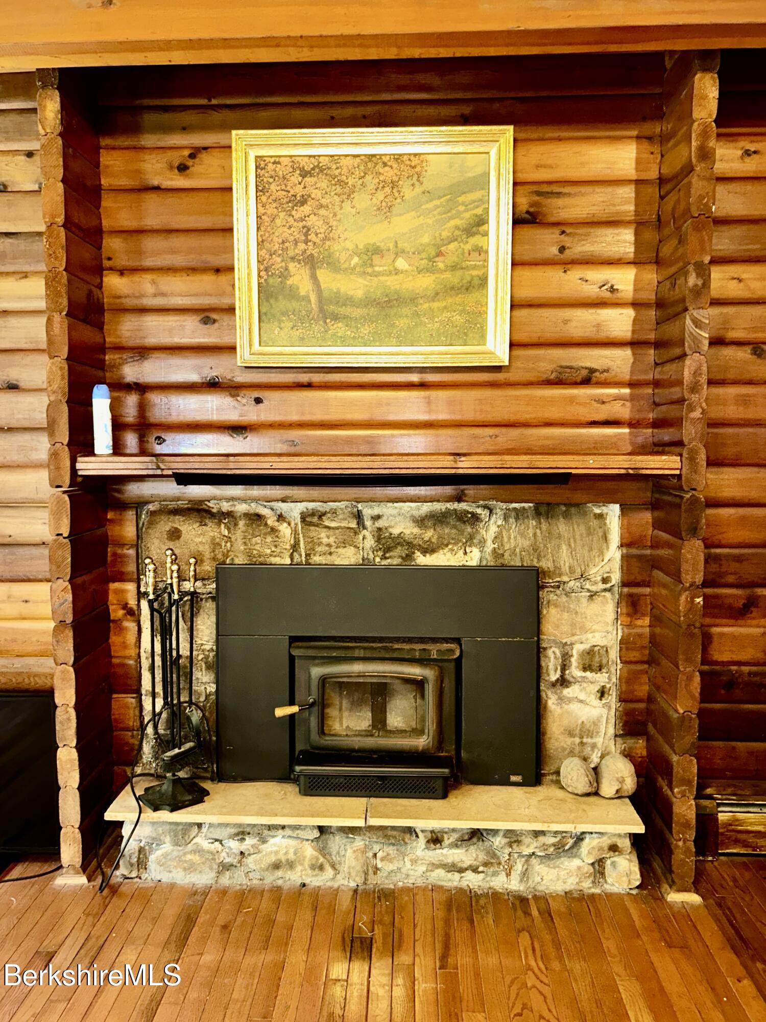 240 Kirchner Road Dalton, MA 01226 - Photo 10 of 36 a living room with a fireplace