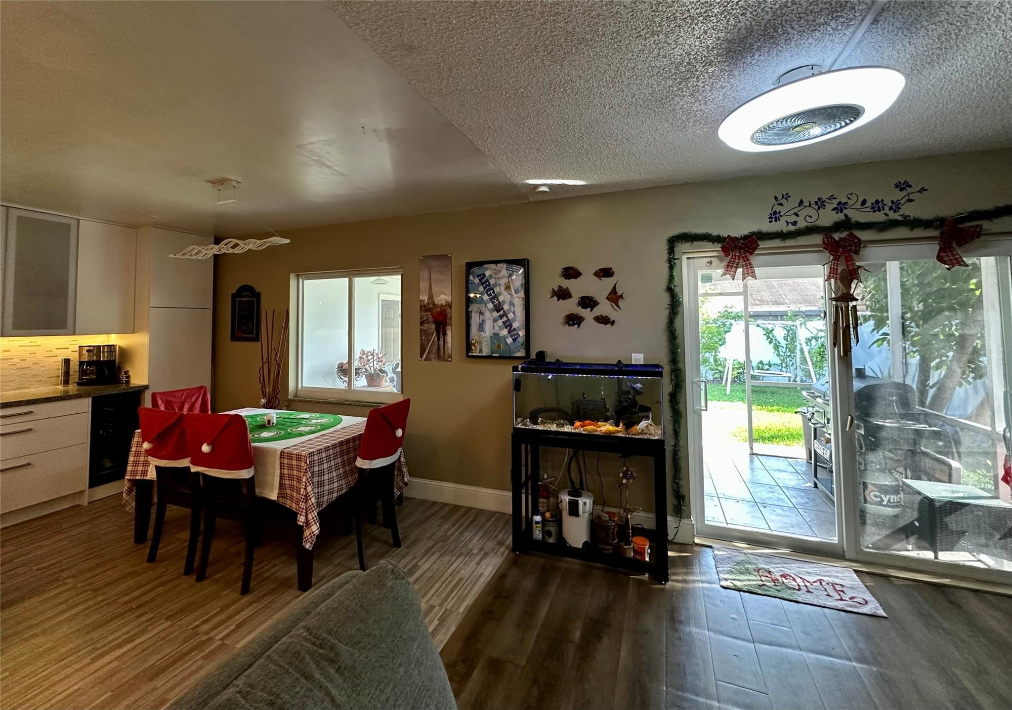 610 Southwest 76th Terrace North Lauderdale, FL 33068 - Photo 32 of 49 a living room with furniture and wooden floor