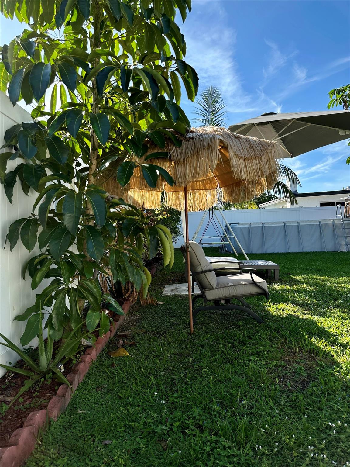 610 Southwest 76th Terrace North Lauderdale, FL 33068 - Photo 38 of 49 a view of a backyard with a patio