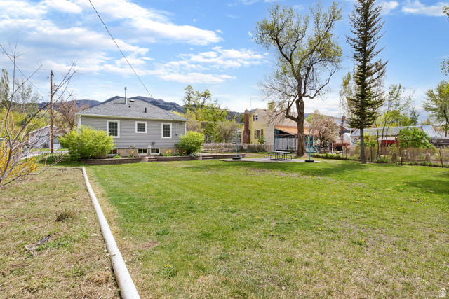 141 South 400 East Logan, UT 84321 - Photo 34 of 41 View of yard with a patio area