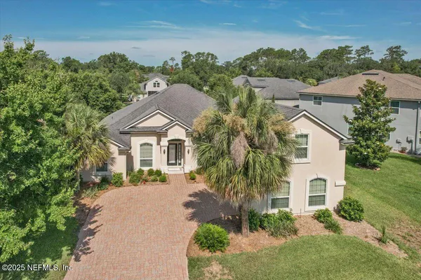 a house view with a garden space