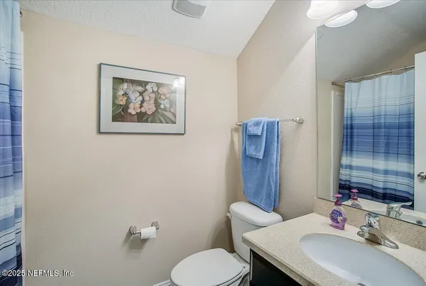 a storage room with washer and dryer
