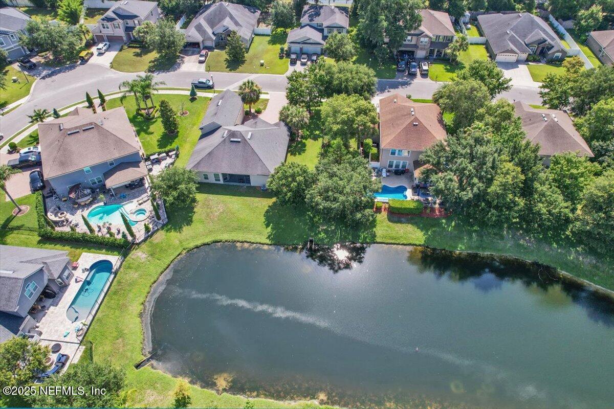 11780 Paddock Gates Drive Jacksonville, FL 32223 - Photo 38 of 39 an aerial view of a house with swimming pool and outdoor space