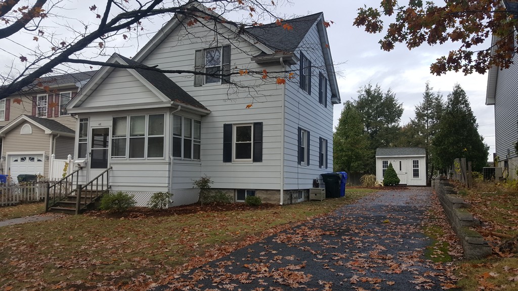 48 Agnes Street Springfield, MA 01118 - Photo 1 of 23 a view of a house with a yard