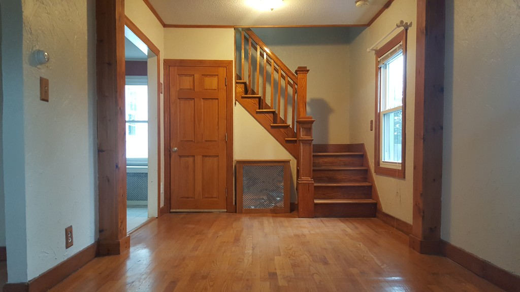 48 Agnes Street Springfield, MA 01118 - Photo 14 of 23 a view of entryway with wooden floor and stairs