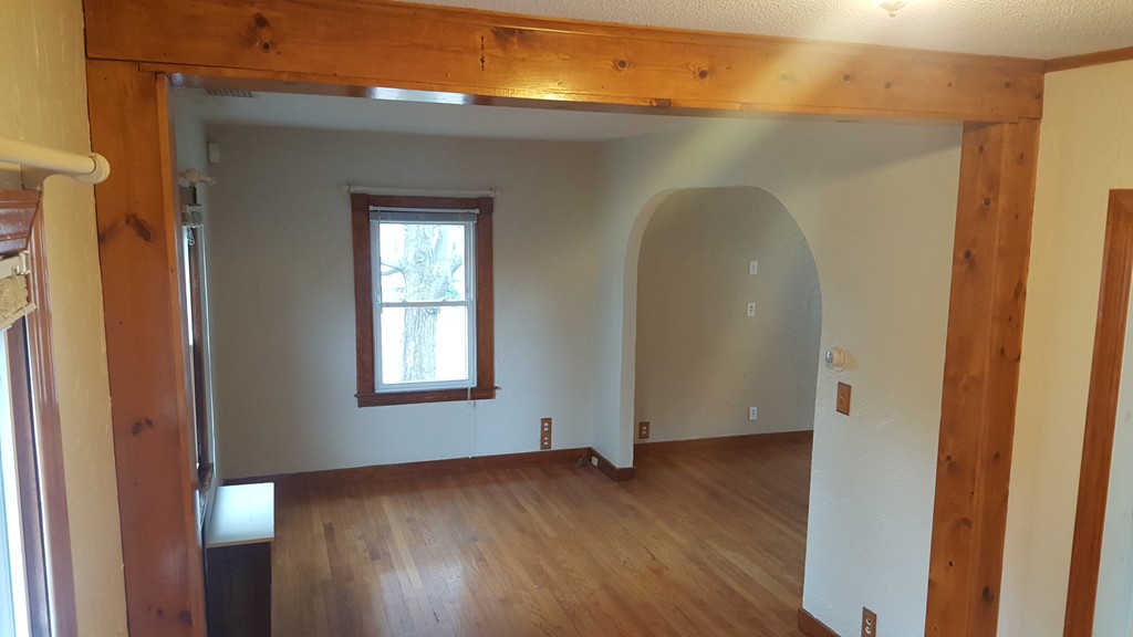 48 Agnes Street Springfield, MA 01118 - Photo 15 of 23 an empty room with wooden floor and windows