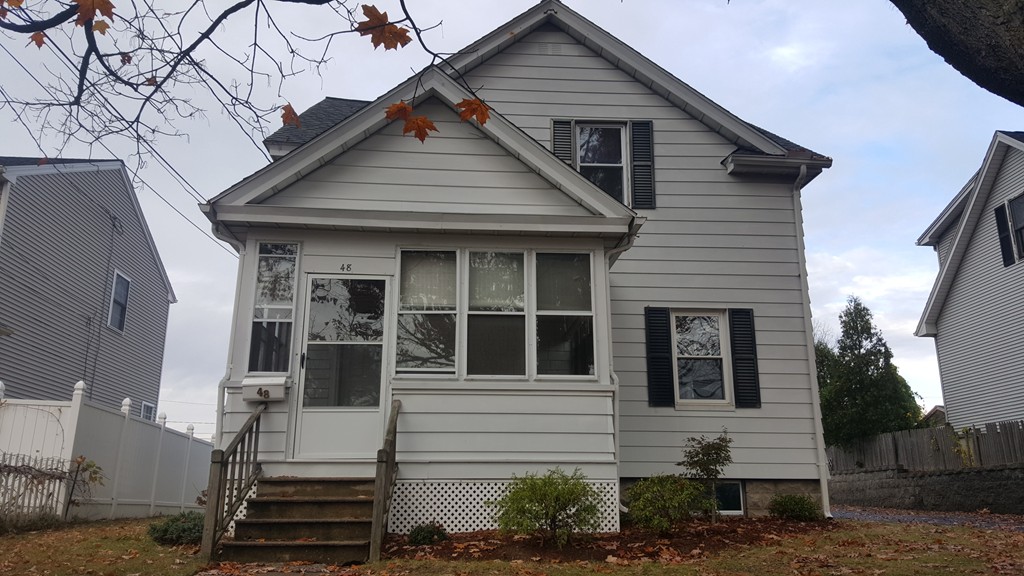 48 Agnes Street Springfield, MA 01118 - Photo 2 of 23 a front view of a house with a yard