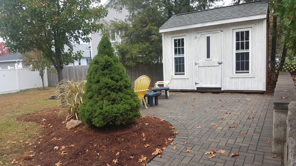 48 Agnes Street Springfield, MA 01118 - Photo 5 of 23 a view of a house with backyard and sitting area