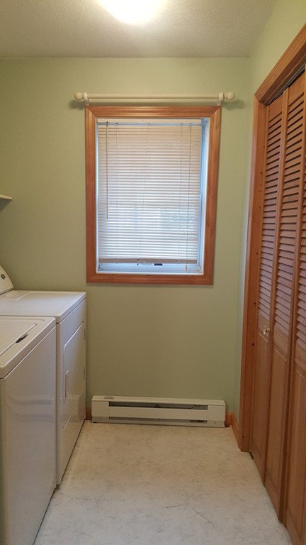 48 Agnes Street Springfield, MA 01118 - Photo 7 of 23 a view of storage and utility room with a window