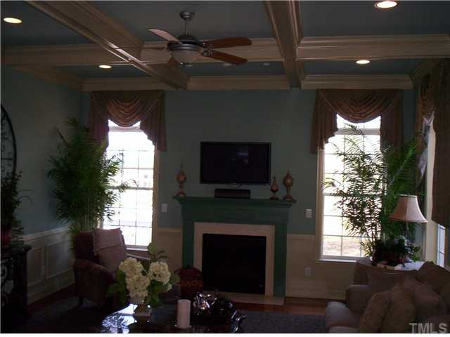 204 Ivyshaw Road Cary, NC 27519 - Photo 6 of 12 Central family room with coffered ceiling