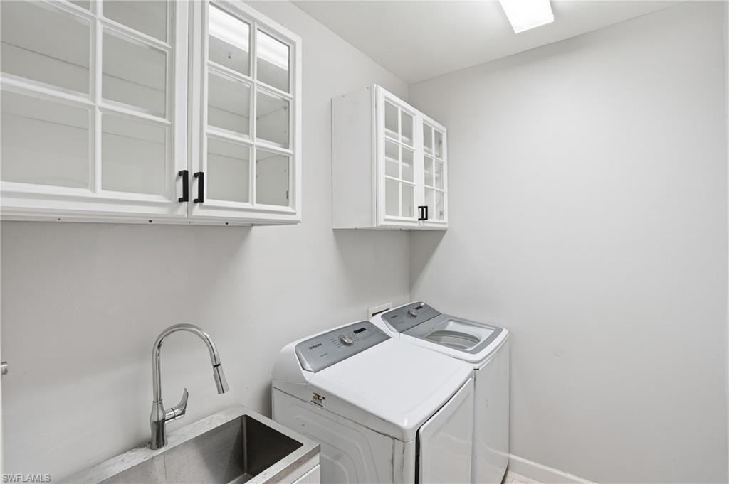 12517 Stone Valley Loop Fort Myers, FL 33913 - Photo 31 of 36 a utility room with dryer and washer