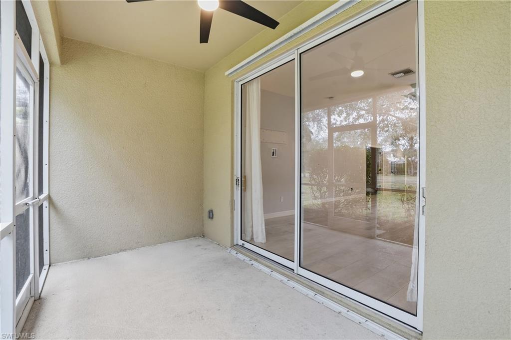 12517 Stone Valley Loop Fort Myers, FL 33913 - Photo 33 of 36 a bathroom with a glass shower door