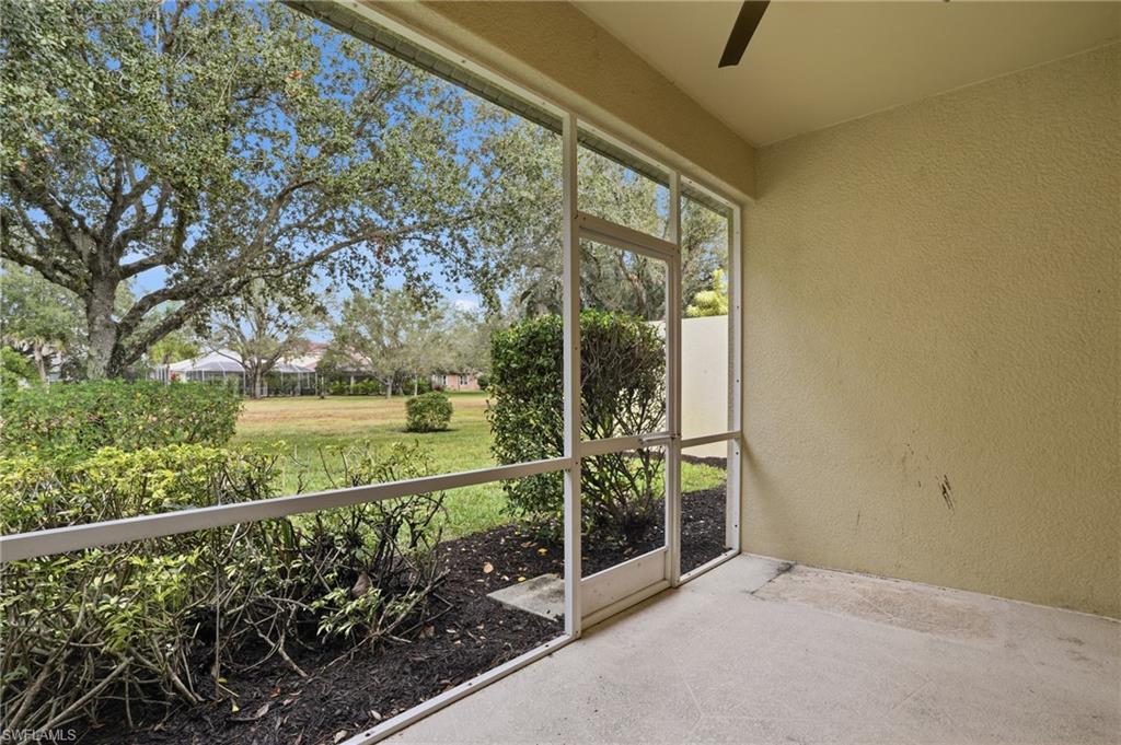 12517 Stone Valley Loop Fort Myers, FL 33913 - Photo 35 of 36 a view of a room with wooden floor and fence
