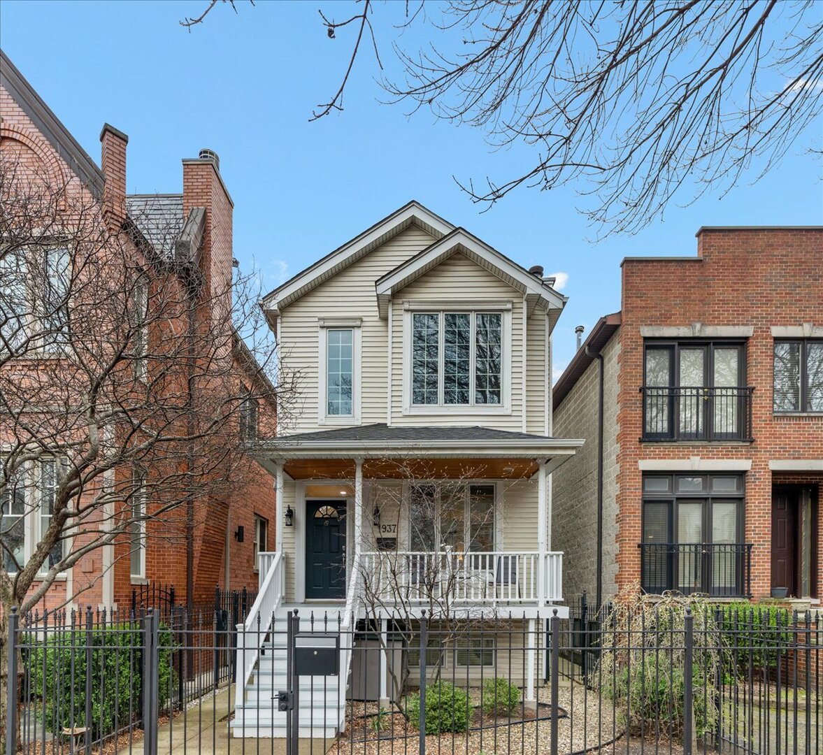 1937 West Melrose Street Chicago, IL 60657 - Photo 1 of 41 a front view of a house with balcony