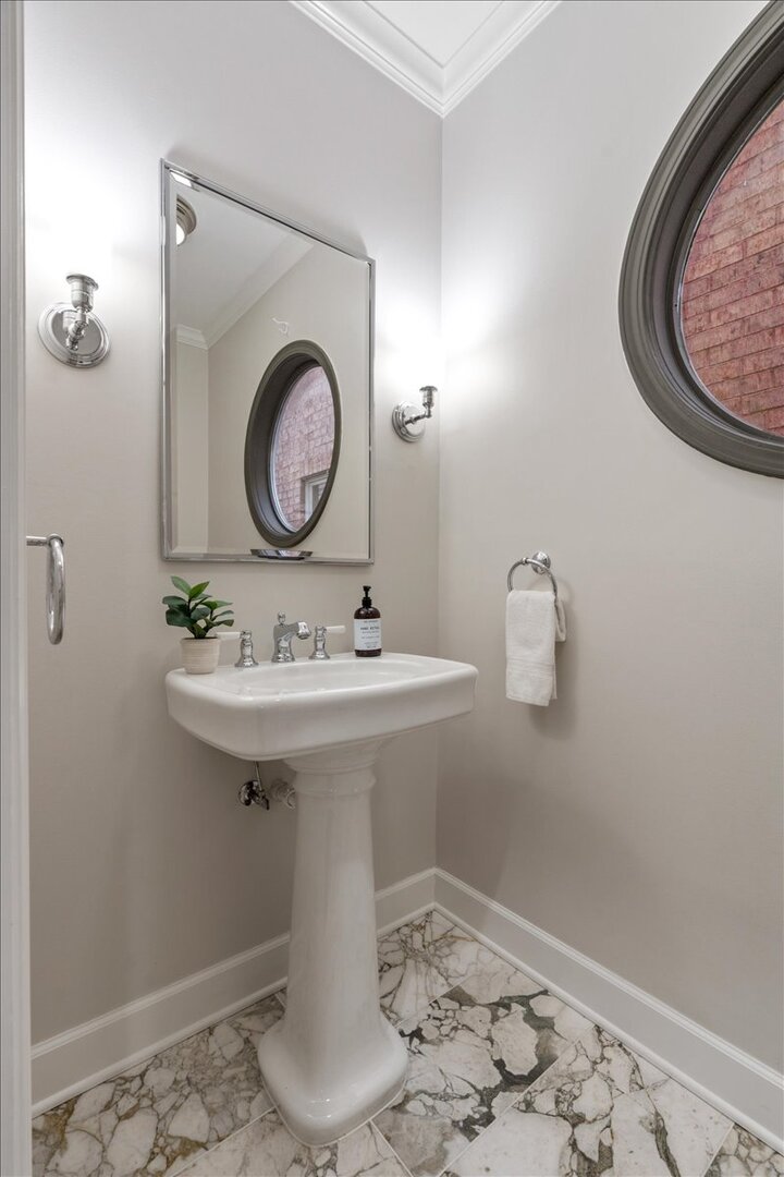 1937 West Melrose Street Chicago, IL 60657 - Photo 17 of 41 a bathroom with a sink and a mirror