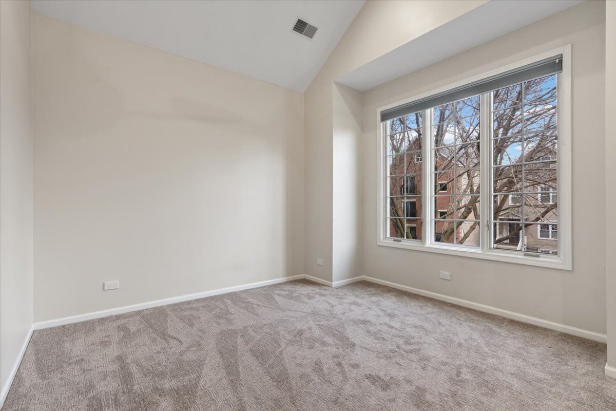 1937 West Melrose Street Chicago, IL 60657 - Photo 23 of 41 a view of an empty room with a window