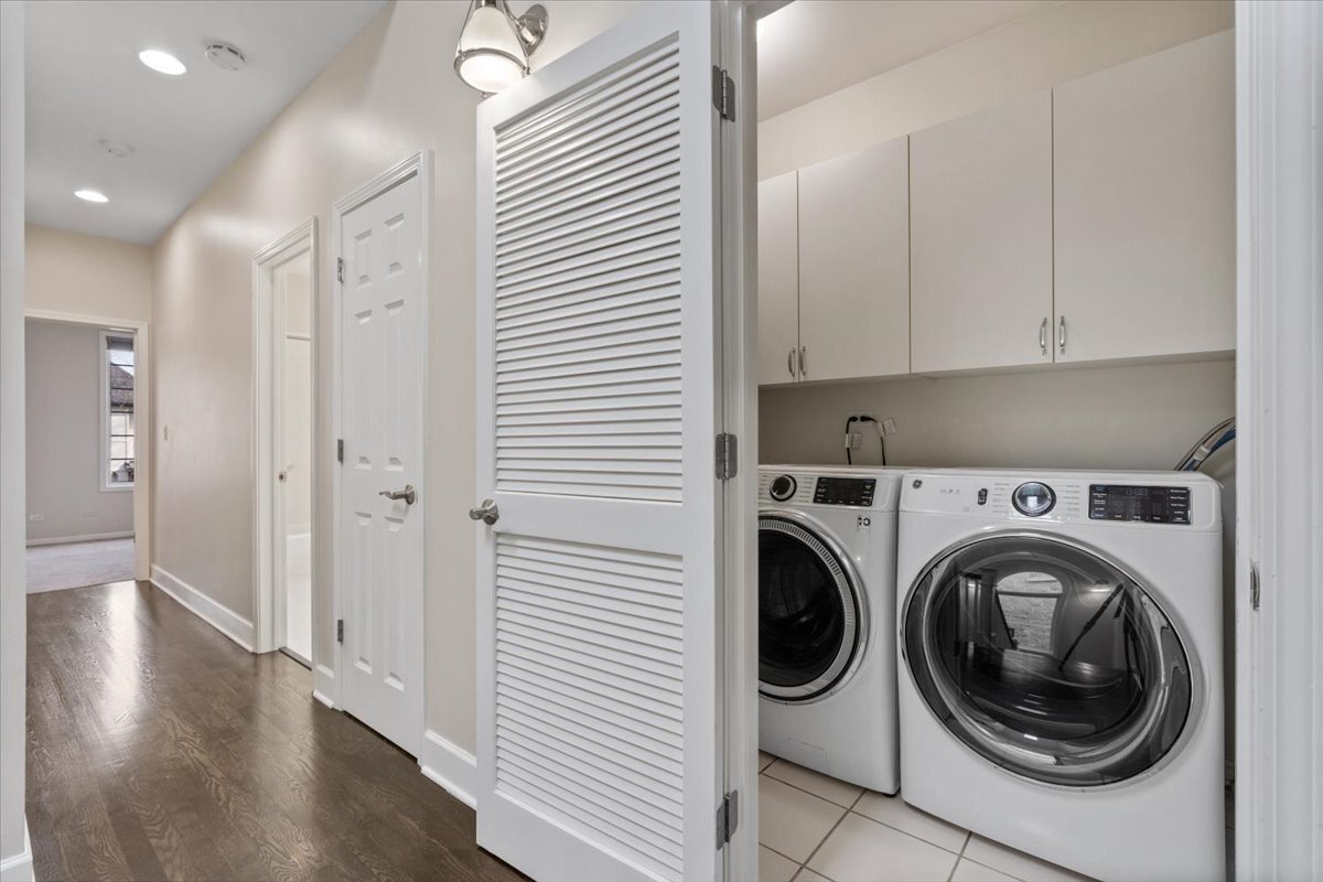 1937 West Melrose Street Chicago, IL 60657 - Photo 26 of 41 a view of a hallway with washer and dryer