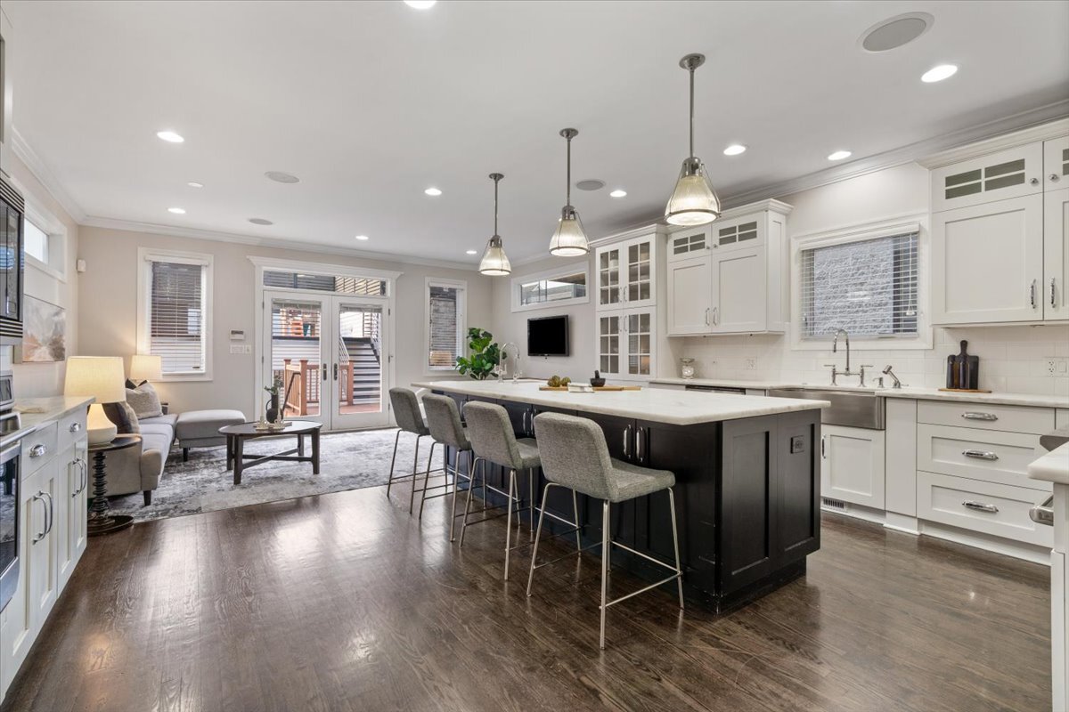 1937 West Melrose Street Chicago, IL 60657 - Photo 8 of 41 a large kitchen with a table and chairs