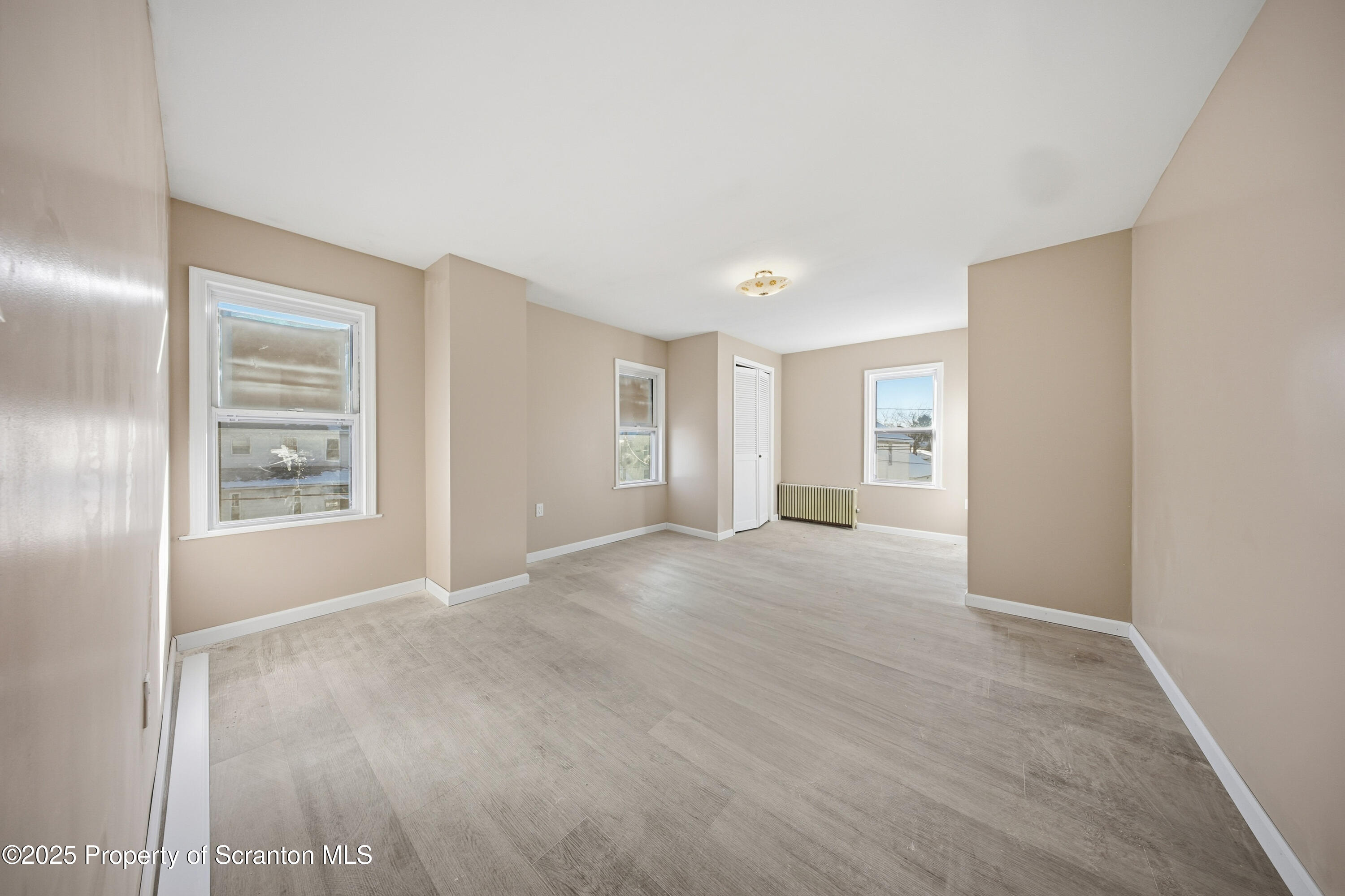 612 Philo Street Scranton, PA 18508 - Photo 15 of 22 a view of an empty room with a window
