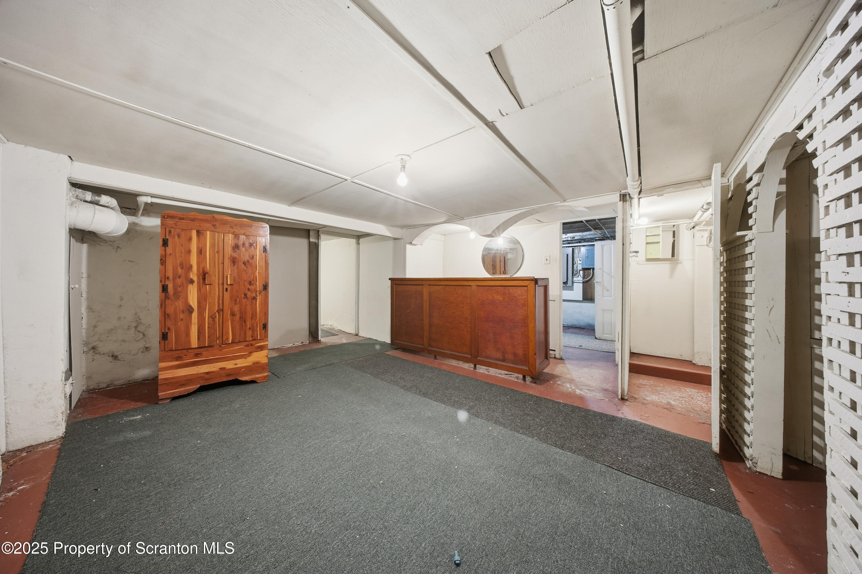 612 Philo Street Scranton, PA 18508 - Photo 21 of 22 a view of a livingroom with furniture and an entryway