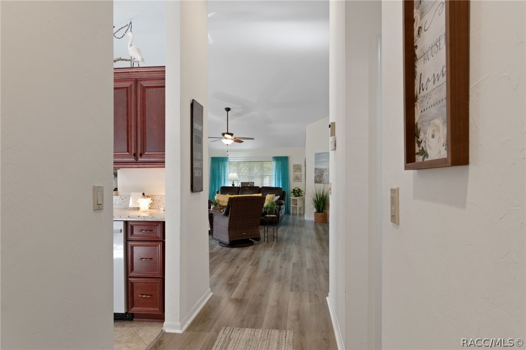 1504 North Foxboro Loop Crystal River, FL 34429 - Photo 5 of 52 Entry Hall with kitchen left and opening into great room concept