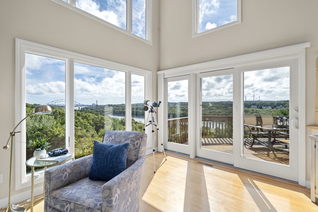 a living room with furniture and windows
