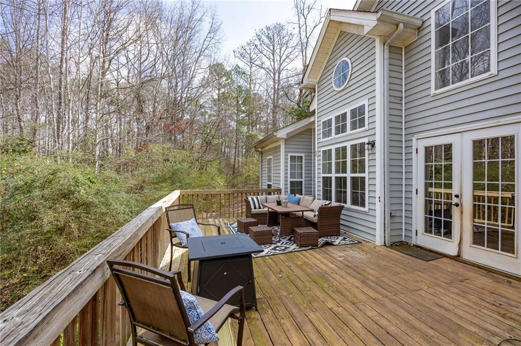7387 Milam Road Winston, GA 30187 - Photo 32 of 41 a view of a patio with a table and chairs