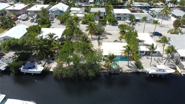 a view of a lake with multiple houses