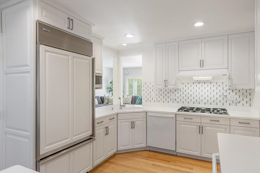 2171 Cedar Avenue Menlo Park, CA 94025 - Photo 12 of 45 a kitchen with white cabinets and white appliances