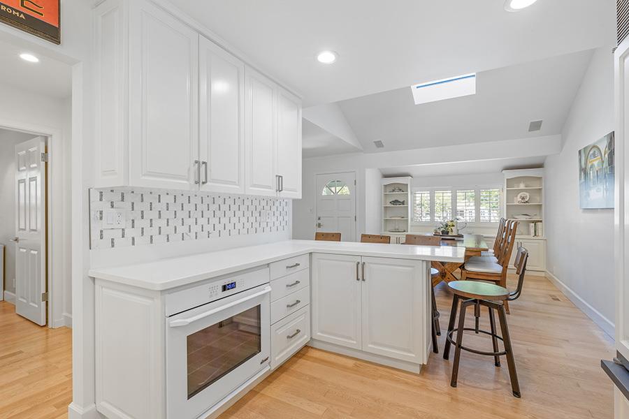 2171 Cedar Avenue Menlo Park, CA 94025 - Photo 14 of 45 a kitchen with a sink cabinets and wooden floor